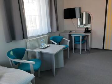 Фото номера Стандартный двухместный номер с 2 отдельными кроватями Отель Hotel Jabłoński г. Доротово 9